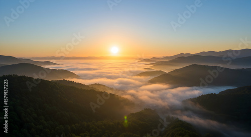Wallpaper Mural Sunrise over misty mountain ranges breathtaking view nature landscape Torontodigital.ca