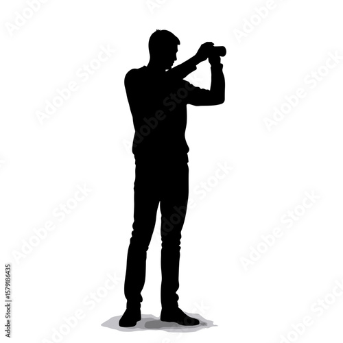 Silhouette of man taking photo with camera against white background  