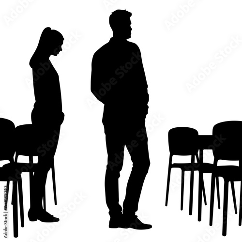Silhouettes of man and woman standing apart near empty chairs  