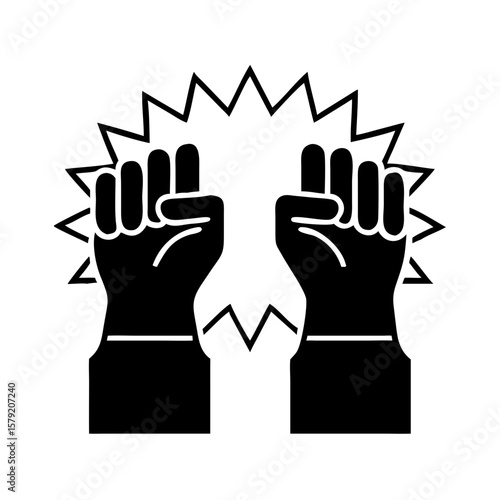 Raised hands clenched into a fist symbolize unity and strength in a powerful gesture