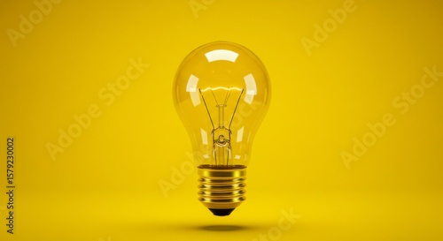Lightbulb on yellow background