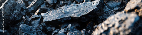 Close-up Photograph of Irregularly Shaped Dark Gray Rocks