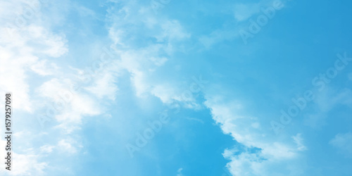 Sky blue effect clouds sunny light effect soft splashed reflection wallpaper. Clouds floating in the sky often evoke a feeling of calm or serenity, the peaceful mood of the image a storm approaching b