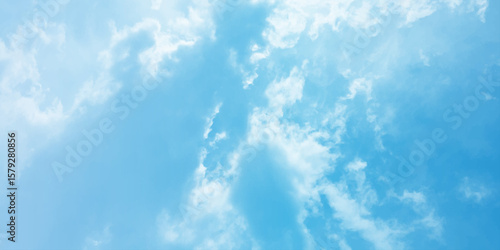 Sky blue effect clouds sunny light effect soft splashed reflection wallpaper. Clouds floating in the sky often evoke a feeling of calm or serenity, the peaceful mood of the image a storm approaching b