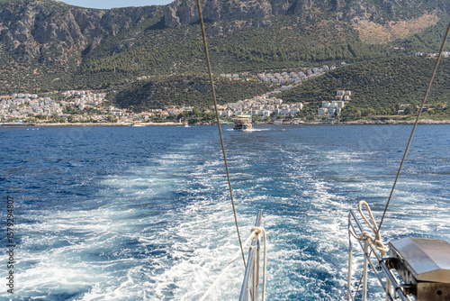 View of Kaş from the sparkling blue sea. Kaş is one of the most well-known and beautiful tourist destinations in the Mediterranean. Antalya - Turkey