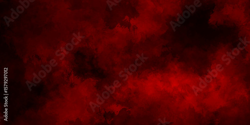 Abstract grunge red and black powder explosion cloud on black background. dark red smoke Like cloud wave effect on black. dark fire flame grunge texture background. toned fiery red sky.
