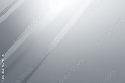Abstract gray background with diagonal light and shadow lines creating a minimalist design with gradient effect and subtle texture