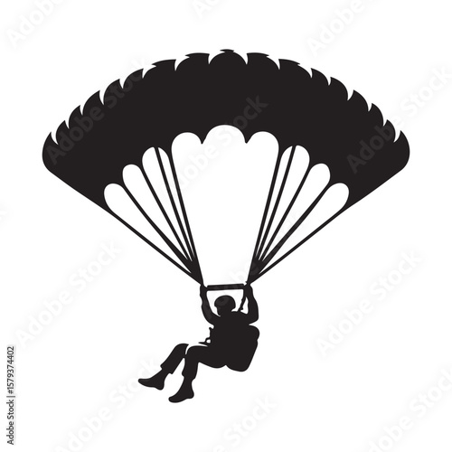 Silhouette of a Person Skydiving with Open Parachute