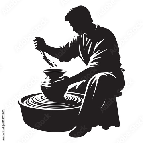 Silhouette of Talented Potter Working with Clay on the Wheel