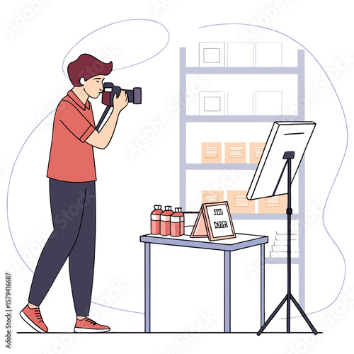 A man taking a picture of bottles and a sign on a table with a shelf in the background in a studio