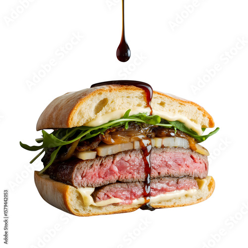 
Gourmet Sliced Steak Sandwich with Balsamic Glaze Drip on Light Background

