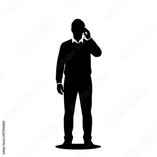 Silhouette of man talking on the phone while standing indoors  