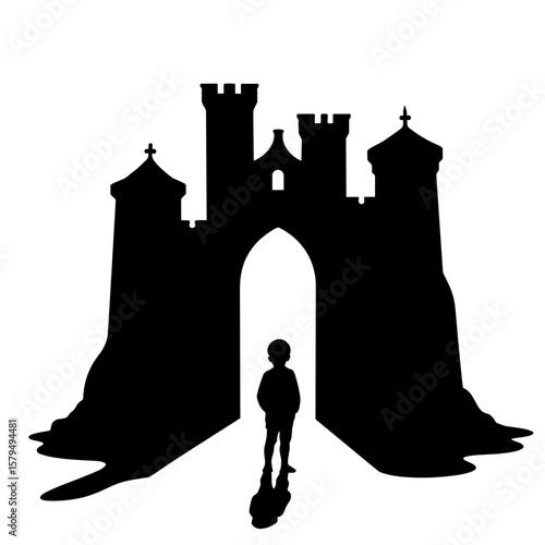 Silhouette of boy standing before a castle gate at sunset  