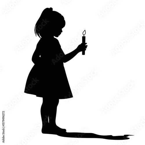 Girl holding a candle and casting a shadow in silhouette form  