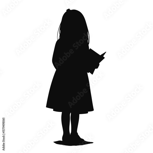 Silhouette of young girl holding book and standing with confidence  