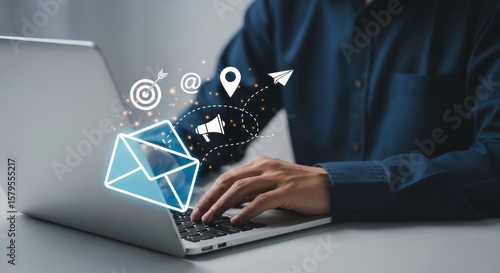 Man typing on laptop with email marketing icons floating above the keyboard in a digital composition