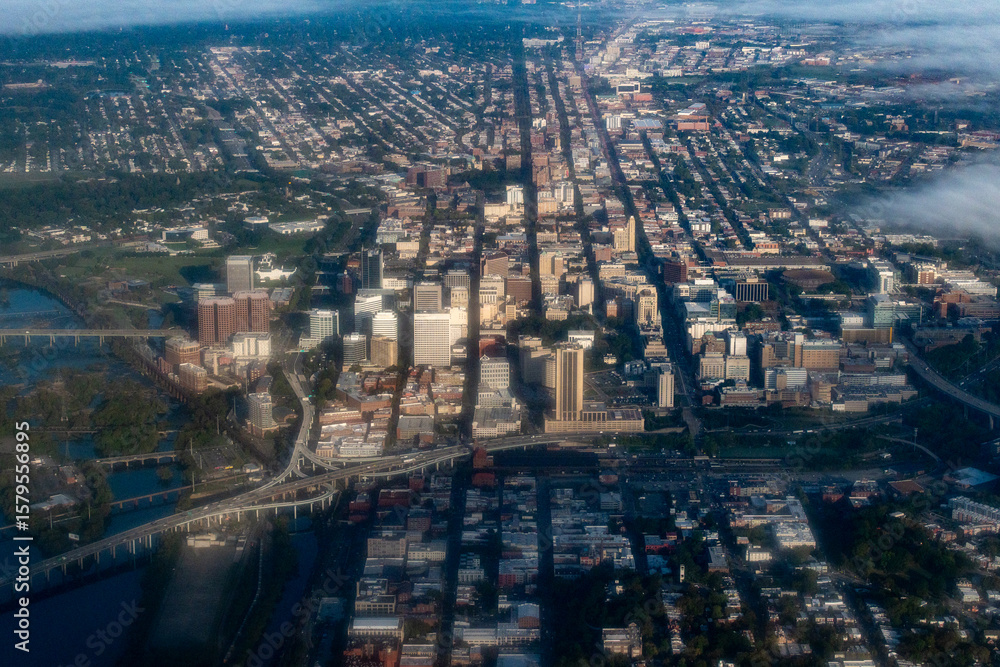 Fototapeta premium Richmond, Virginia - aerial view of the downtown district of Richmond, Virginia with broad street, i-95, the james river and shockoe bottom.