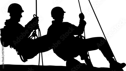 Silhouette of two people rappelling side-by-side, shown in full-body view against a white backdrop. Each person is wearing helmets and climbing gear, with ropes clearly visible. The composition convey