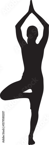 Silhouette of person in yoga tree pose vrikshasana