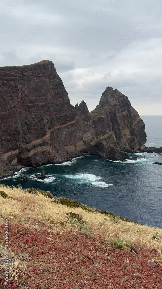 Desert landscapes of Cape Sao Lourenco. Majestic rock formation with triangle shape over the Atlantic ocean. Nature of Madeira Island, Portugal, PR8 Vereda da Ponta de Sao Lourenco. Desert landscapes of Cape Sao Lourenco. Majestic rock formation with triangle shape over the Atlantic ocean. Nature of Madeira Island, Portugal, PR8 Vereda da Ponta de Sao Lourenco.