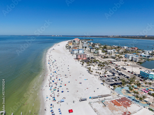 Tourists and locals at the beach near downtown Fort Myers Beach on Estero Island, southwest Florida in Lee County