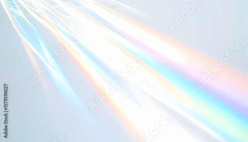 Rainbow Light Refraction on White Surface Creates Abstract Pattern