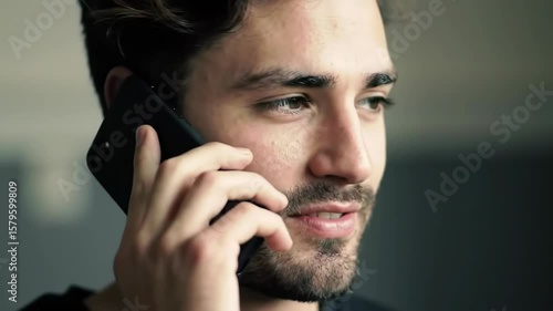 Young Man Talking on Phone, Close-Up Shot, Facial Expressions, Communication Concept
