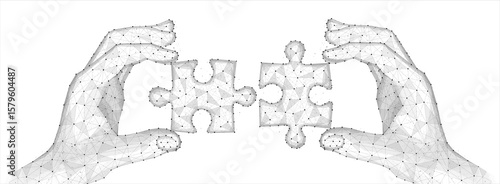 Two connected puzzles and two hands. Partner collaborate, cooperate implement