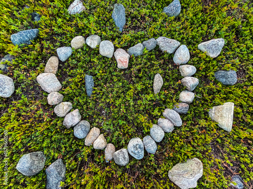 Stones arranged in the shape of a heart on moss-covered forest ground. A natural symbol of love, harmony, and connection with nature. Perfect for themes of romance, ecology, and outdoor beauty.






