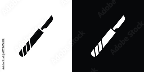Photos Scalpel icon Flat Solid Style in black and white colors