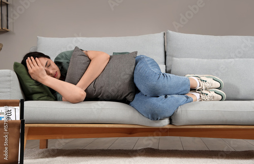 Depressed young woman with ...