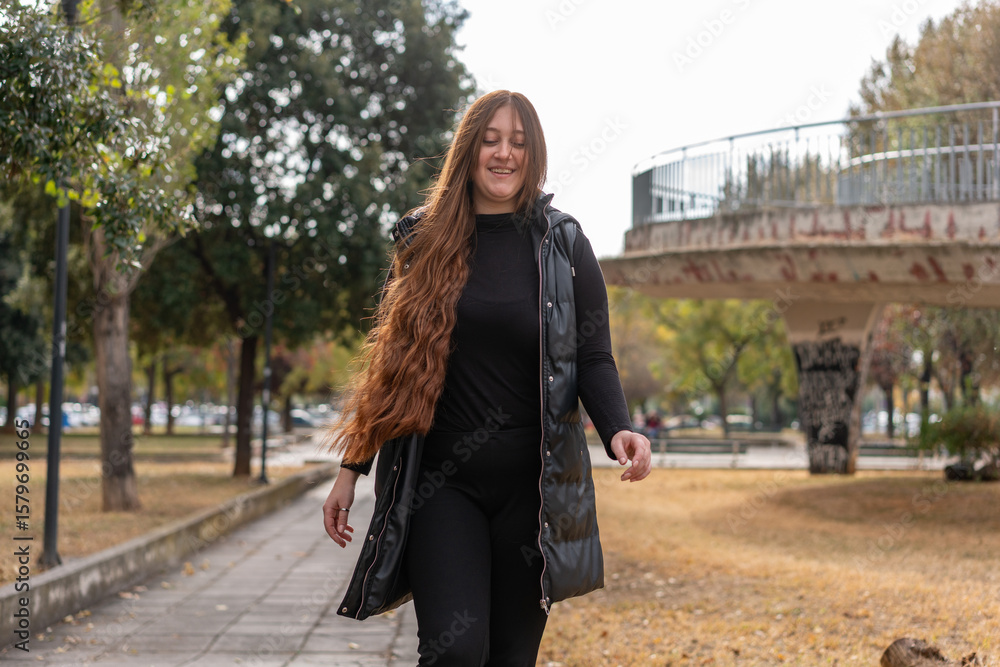Fototapeta premium Unedited Portrait of a Young Woman Walking in the City – Facial Expressions Showing Various Emotions