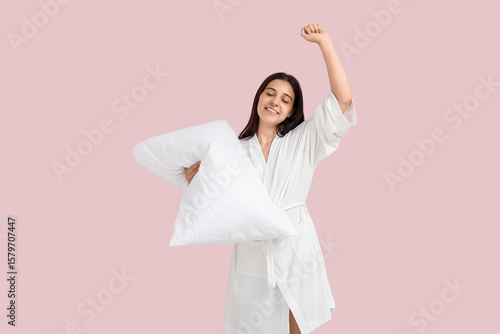Young woman in robe with pi...