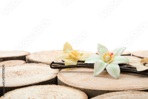 Vanilla pods and flowers on...