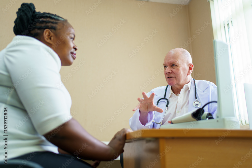 Fototapeta premium African woman have a medical examine and checkup with doctor in hospital.