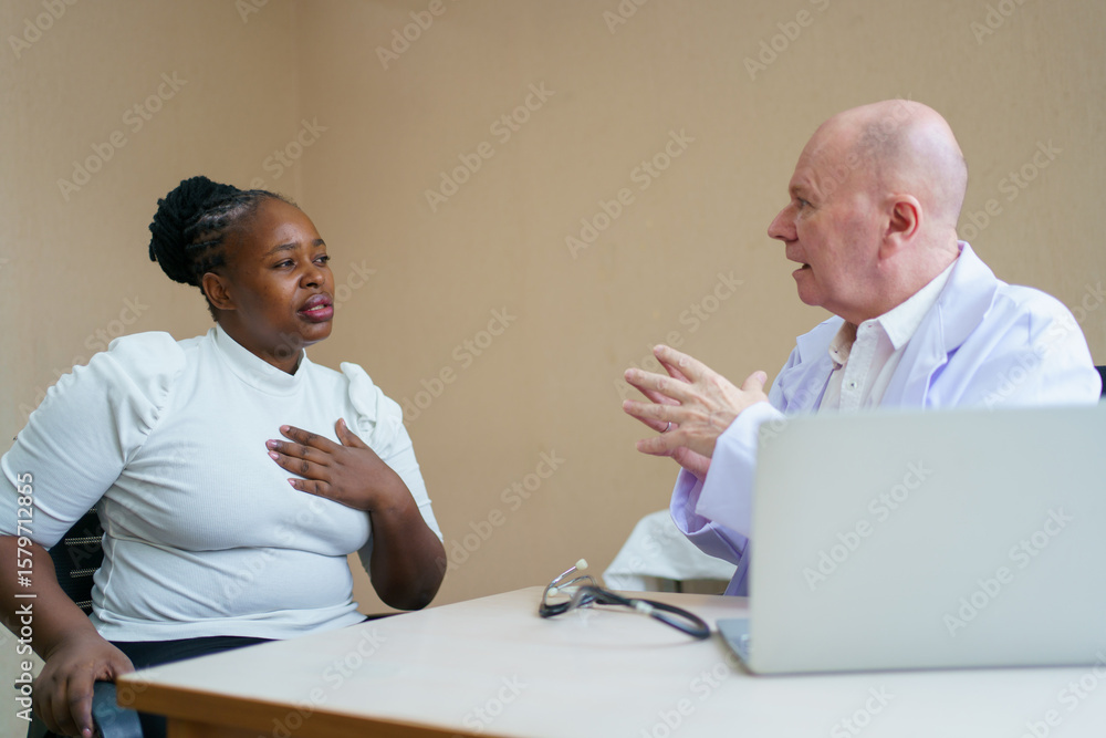 Obraz premium African woman have a medical examine and checkup with doctor in hospital.