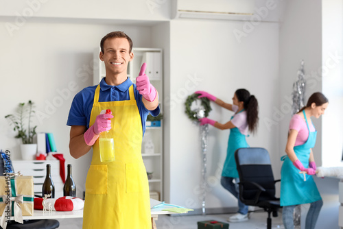 Male janitor with detergent...