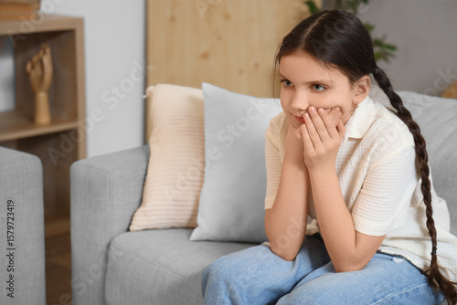 Cute girl suffering from to...