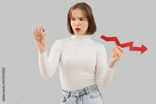Upset young woman with bitc...
