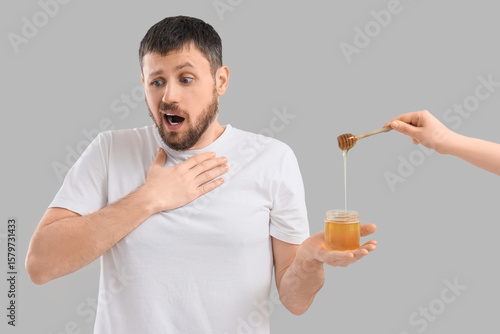Sick young man and female h...