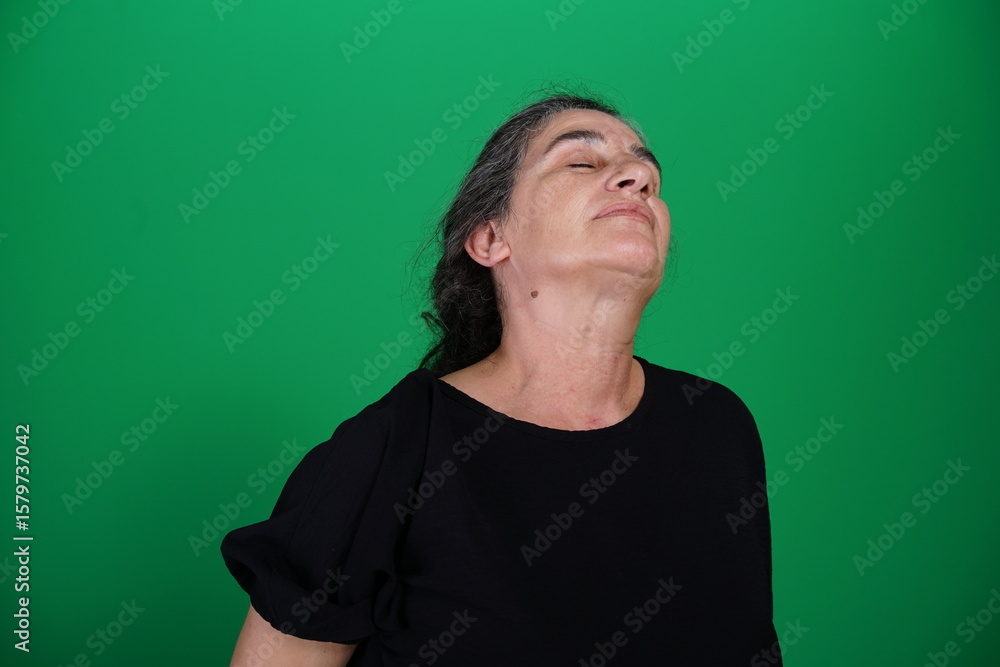Unedited Portrait of Woman’s Face Expressing Various Emotions – Green Studio Background Unedited Portrait of Woman’s Face Expressing Various Emotions – Green Studio Background