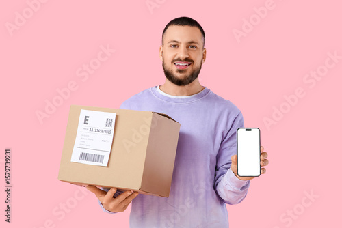 Young man with parcel and b...