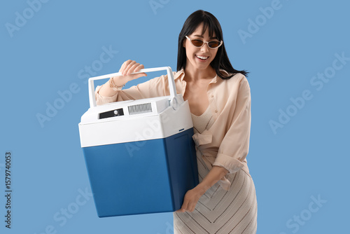 Young woman with portable f...