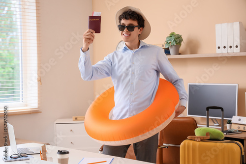 Young businessman with swim...