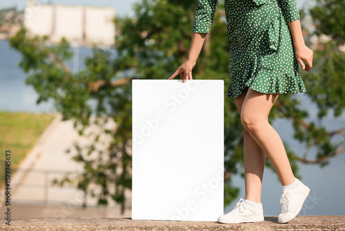 Female hands holding blank ...