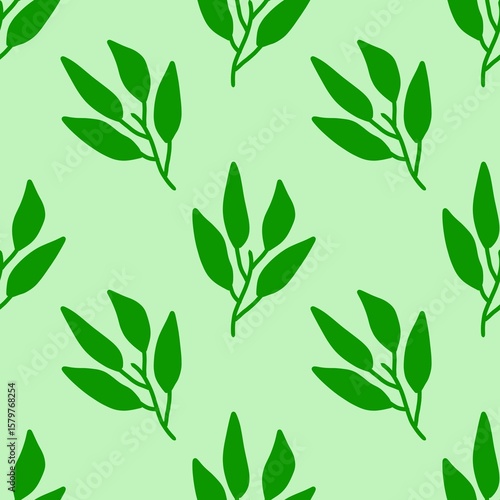 seamless pattern with green tea leaves on green background 