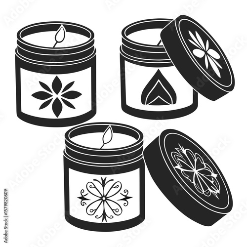 Four black scented candle jar silhouettes with decorative labels scented candles
