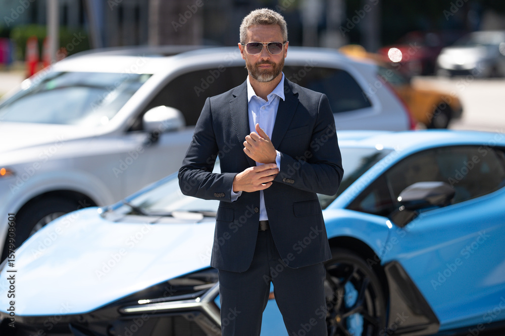 custom made wallpaper toronto digitalHandsome businessman outdoors. Rich businessman standing next to a luxury car. Global business. Successful business. Elegant businessman standing in front of expensive car. Successful businessman.