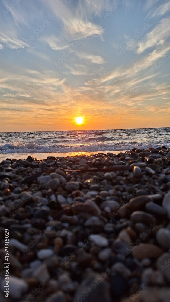 Obraz premium Footstep print on sand during sunset on beach, Preveza, Greece