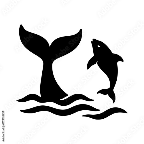 Silhouette of a dolphin jumping near a whale s tail in the ocean